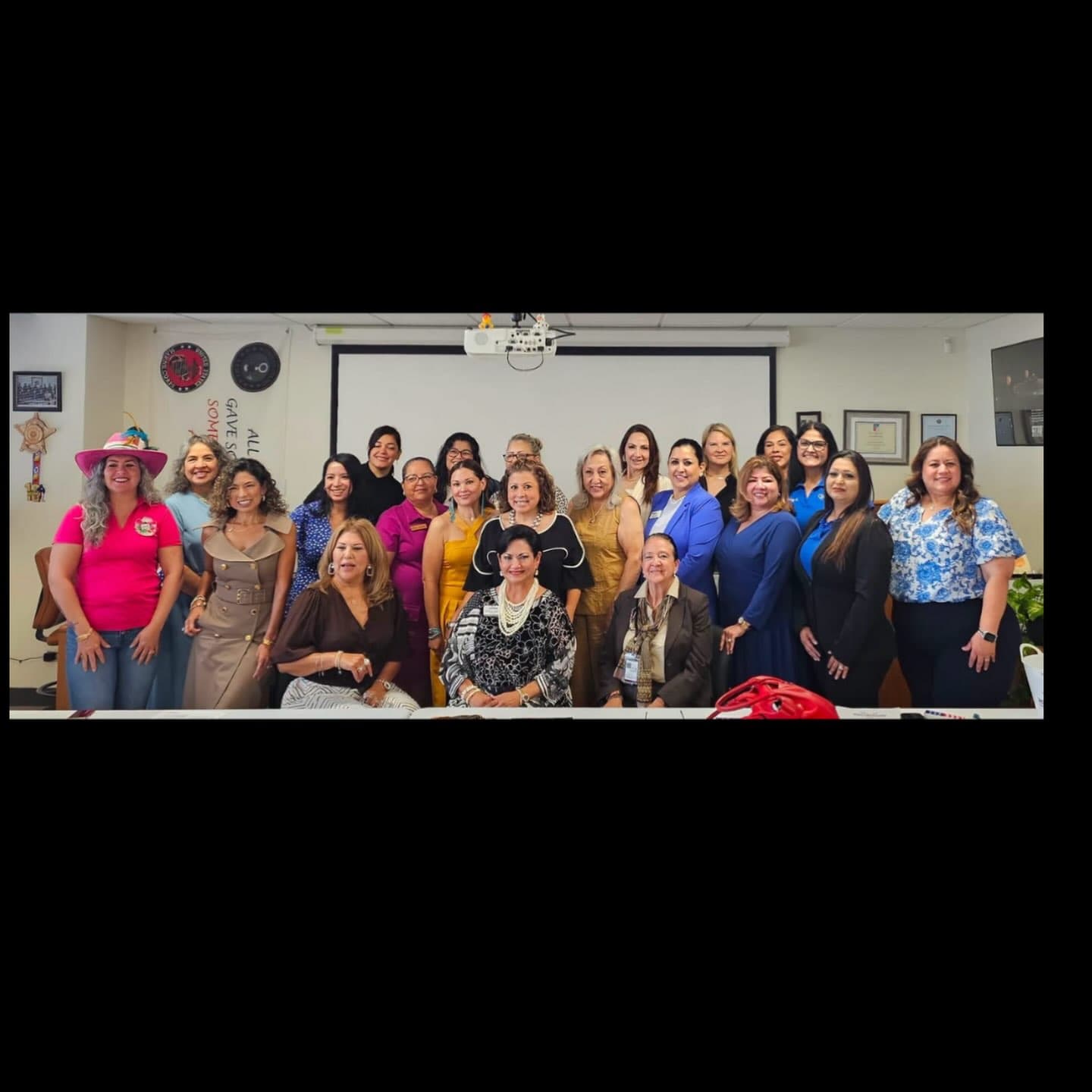 The Twists & Tales owners with women of the RGV Hispanic Chamber at Pláticas y Café Entre Mujeres.